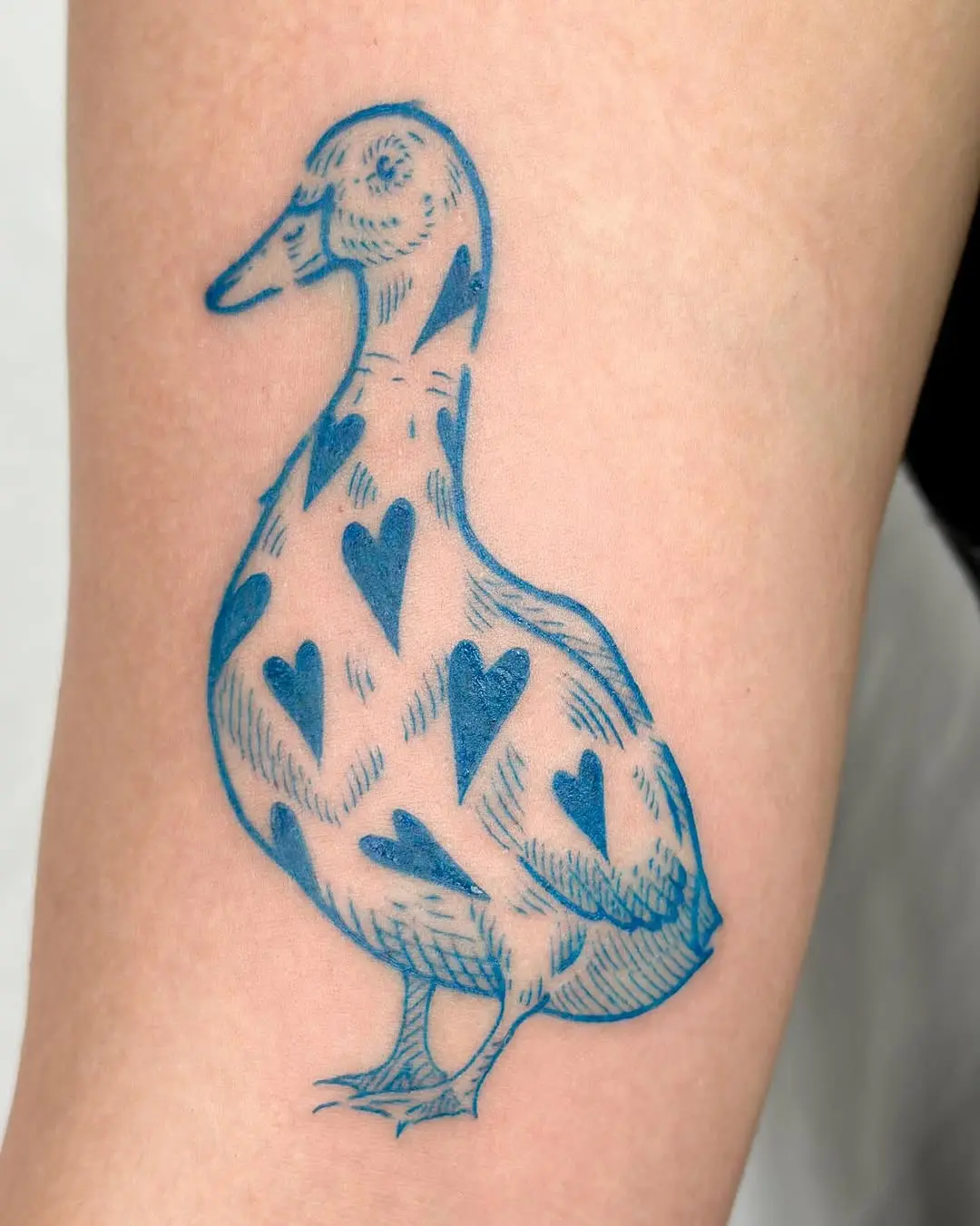 Charming Duck Tattoo with Heart Patterns