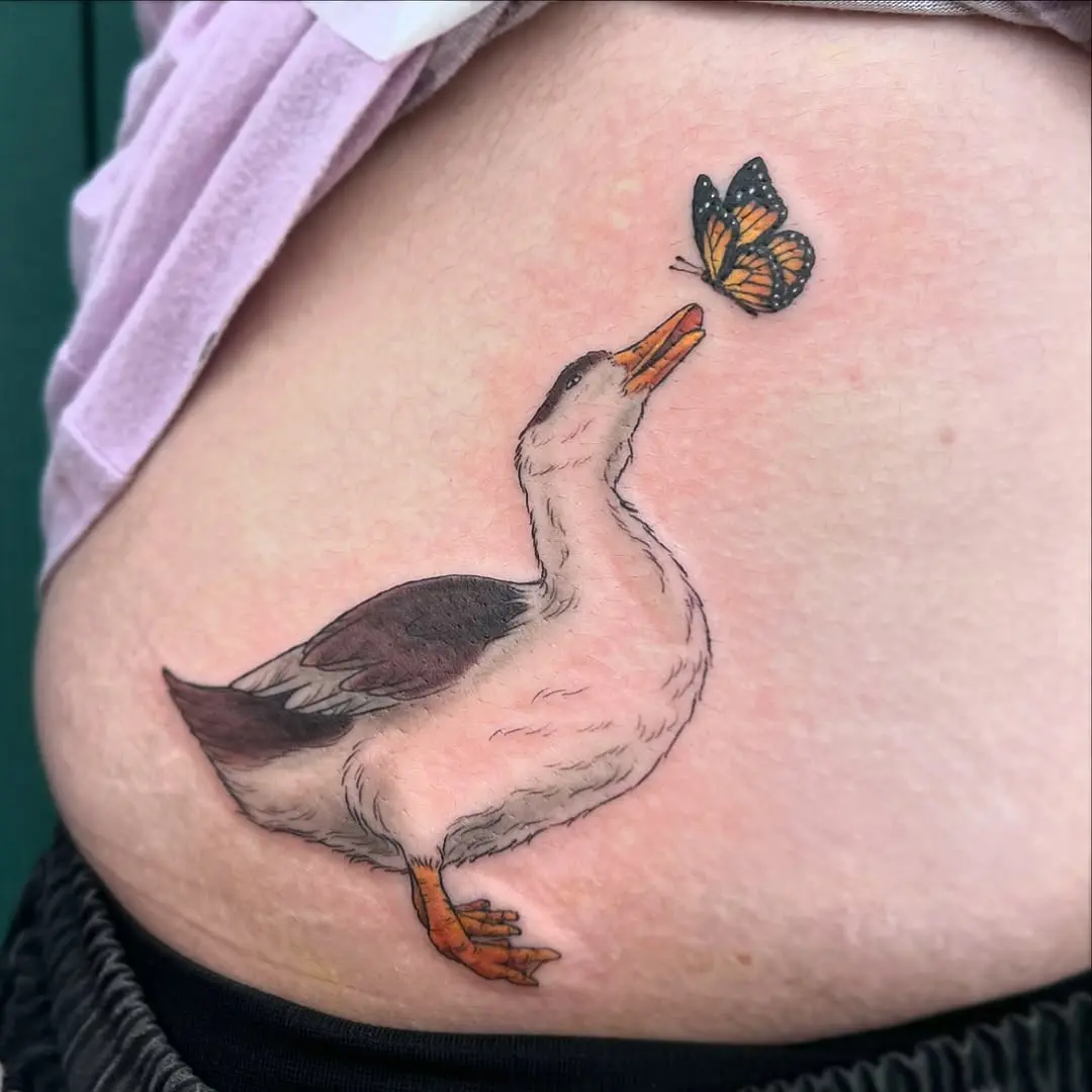 Whimsical duck meeting a delicate butterfly