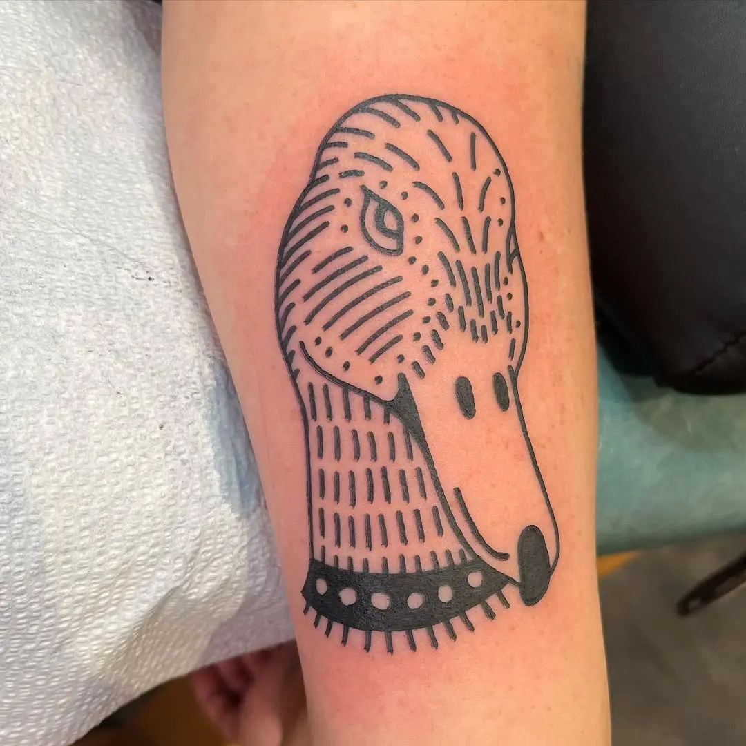 Playful duck tattoo with unique line art style