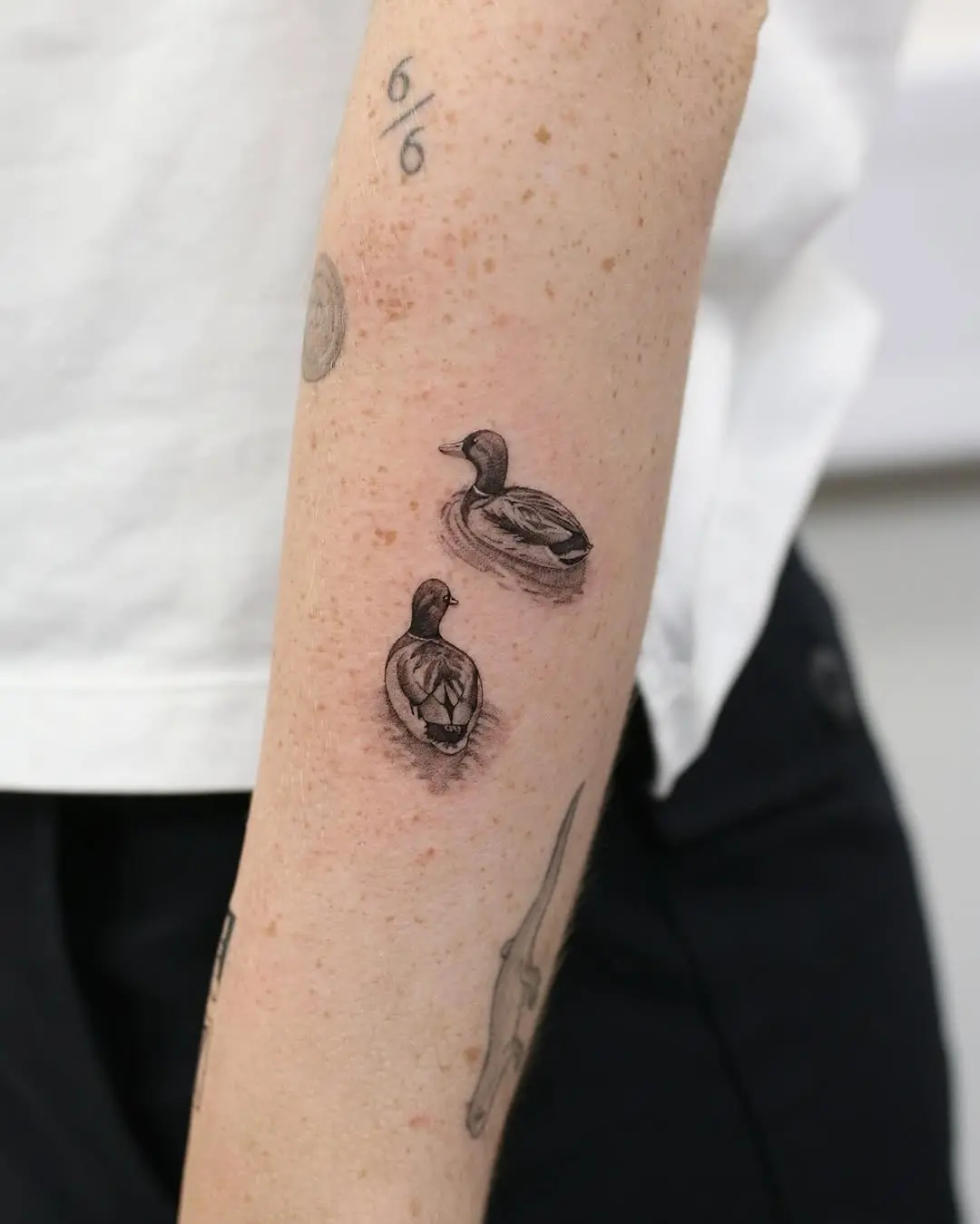 Charming Duck Tattoos in Artistic Watercolor Style