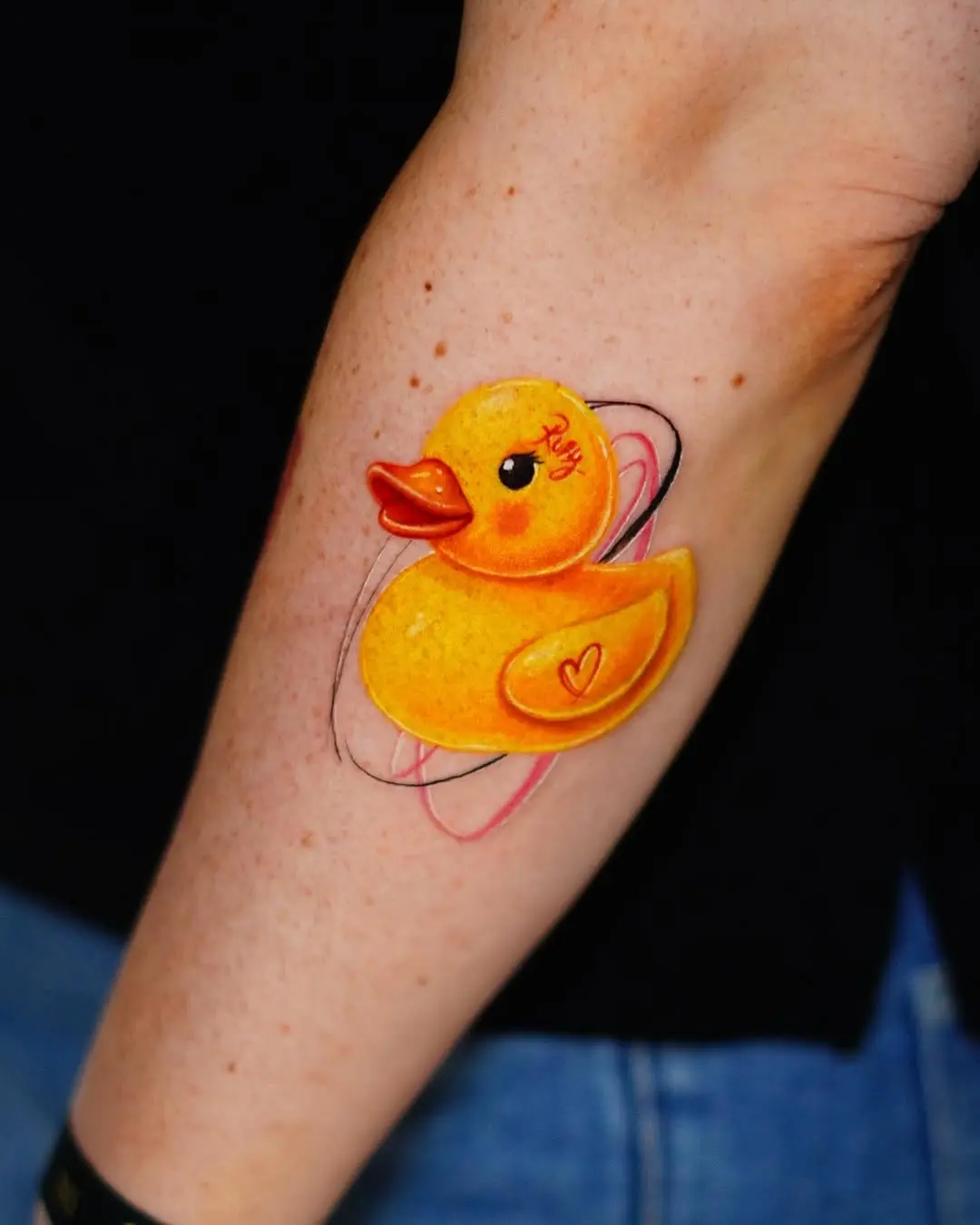 Bright and playful yellow duck tattoo design