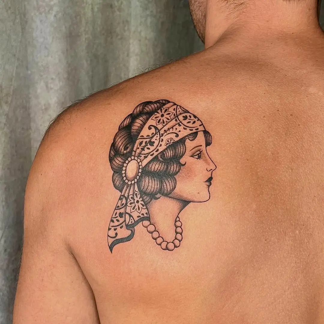 Elegant gypsy woman tattoo showcasing beauty and grace