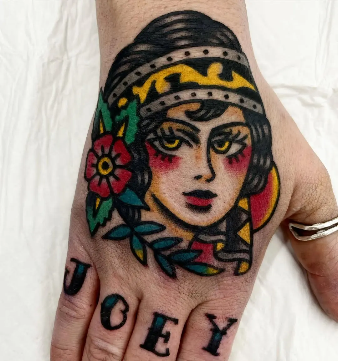Vibrant Gypsy Woman Tattoo on Hand