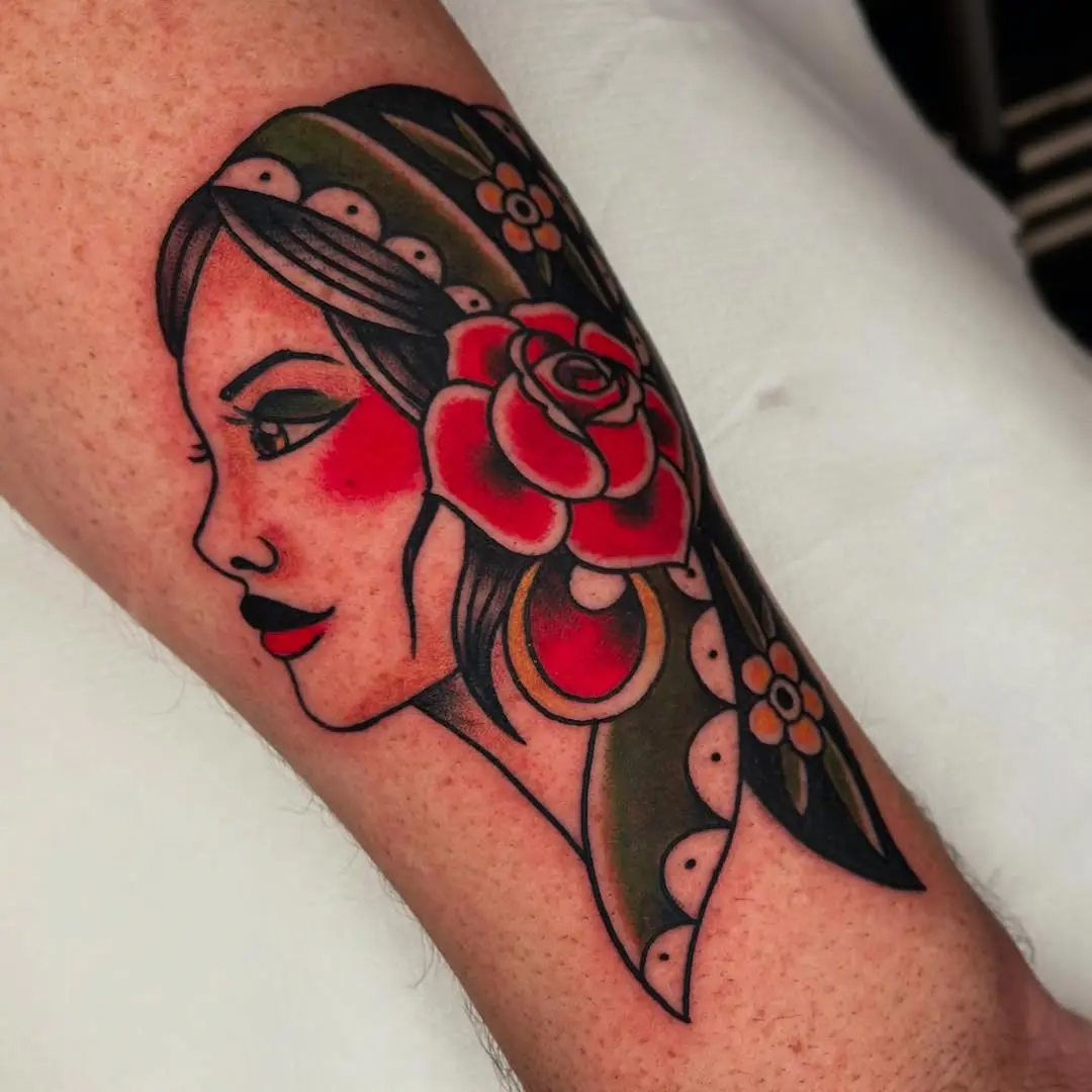 Vibrant Gypsy Woman Tattoo with Floral Elements