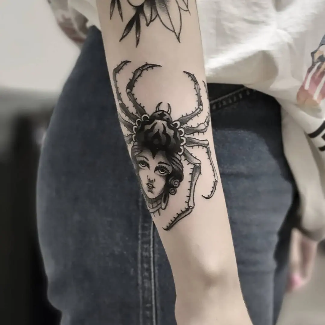 Intricate Spider Woman Tattoo in Black Ink