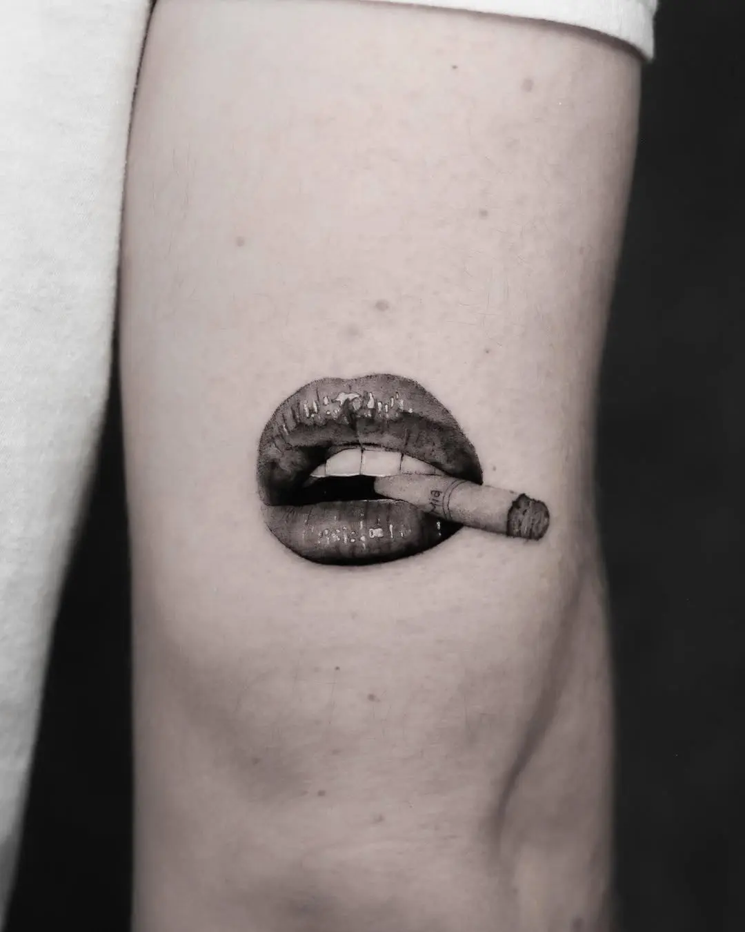 Artful lip tattoo with a smoking twist