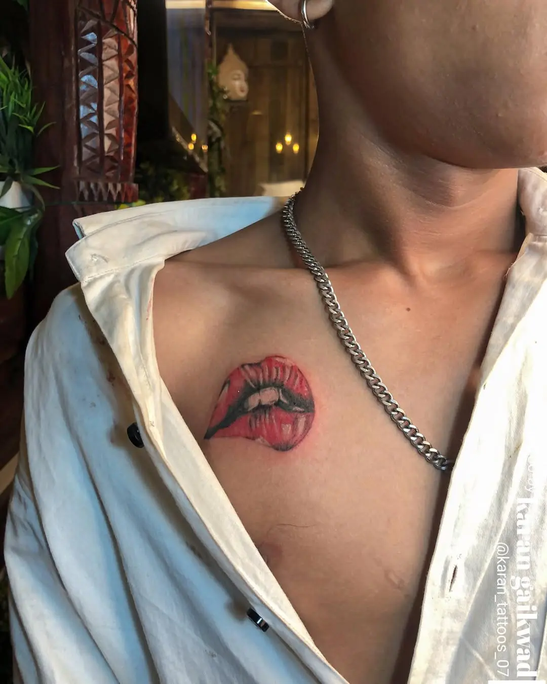 Vibrant Lip Tattoo on Chest