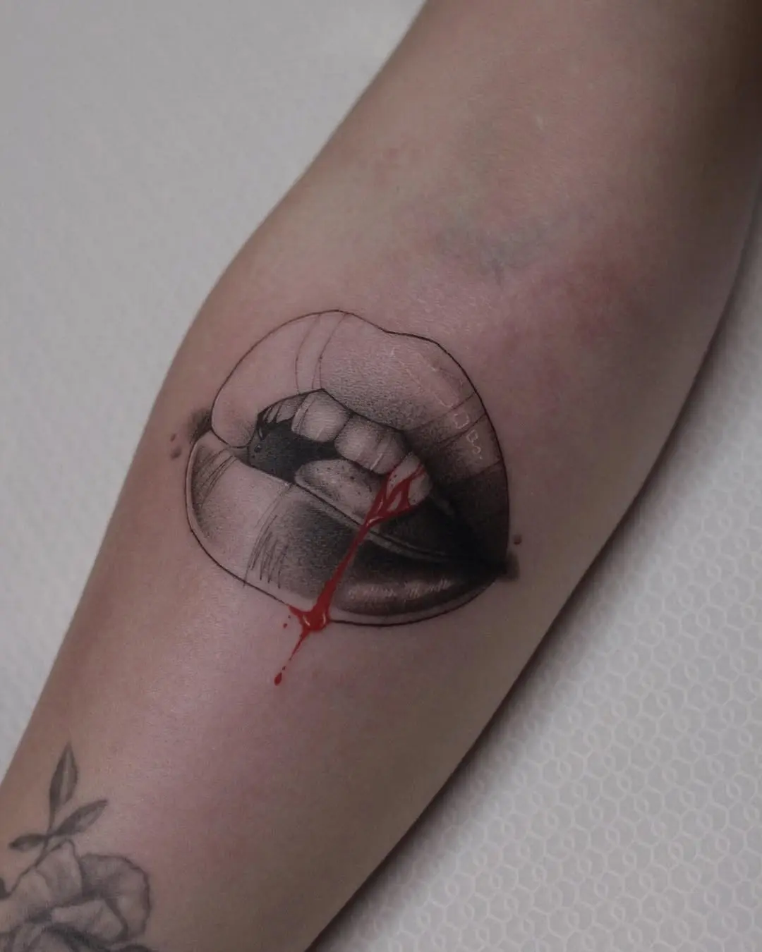 Stunning realistic lip tattoo with blood effect