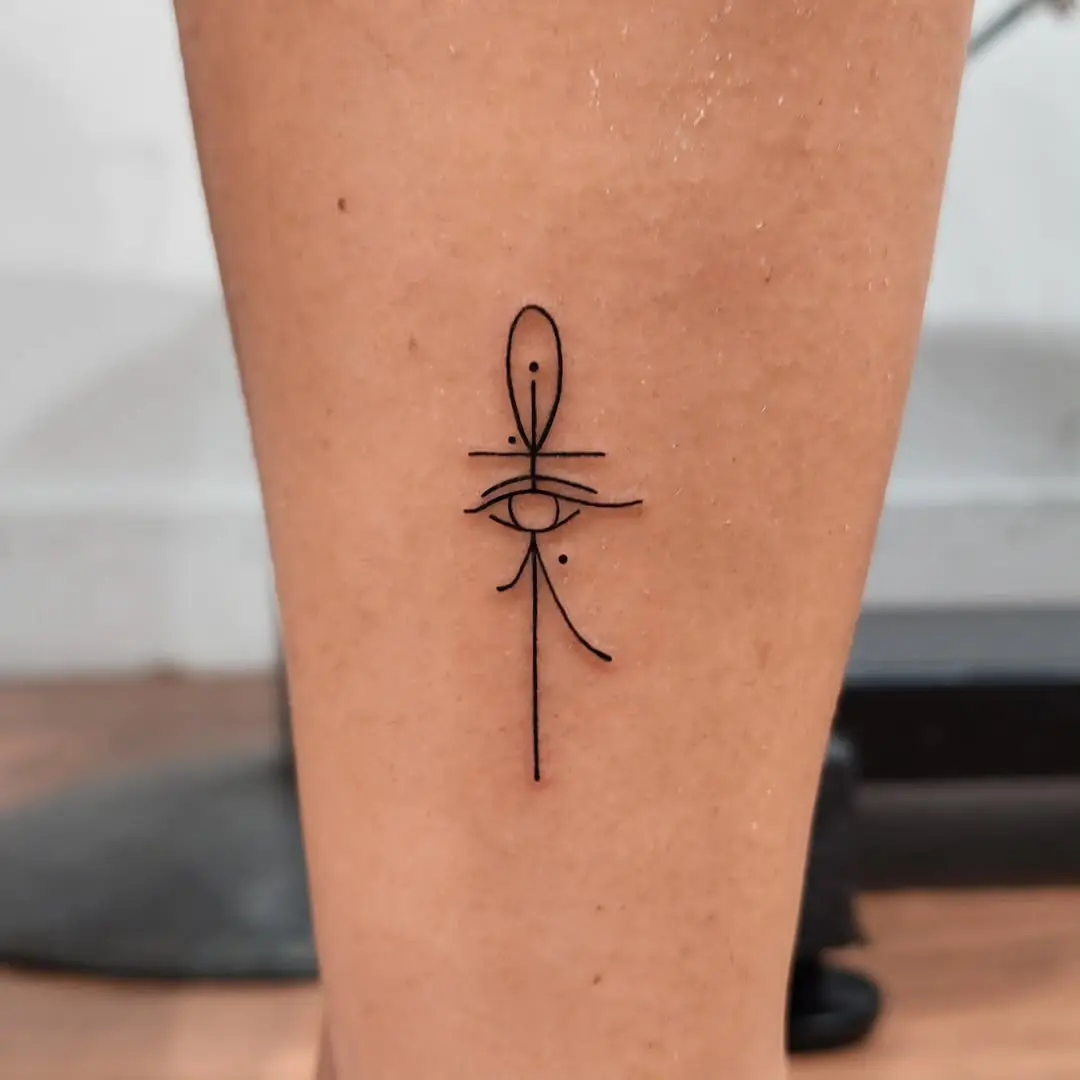 Symbolic Ankh Tattoo with Eye Design