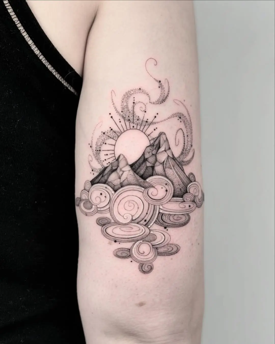 Stunning mountain and cloud tattoo design