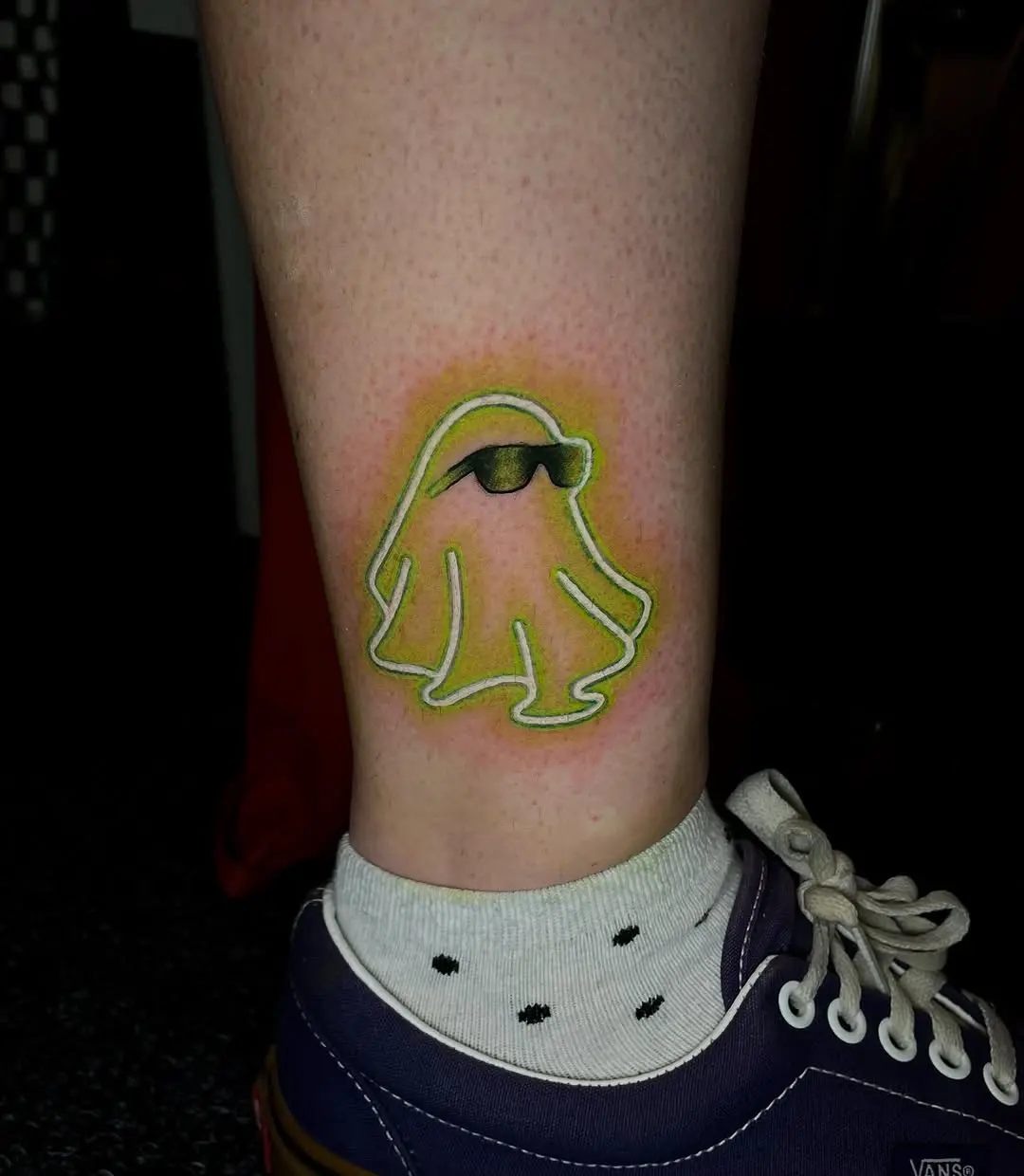 Charming neon ghost tattoo with sunglasses