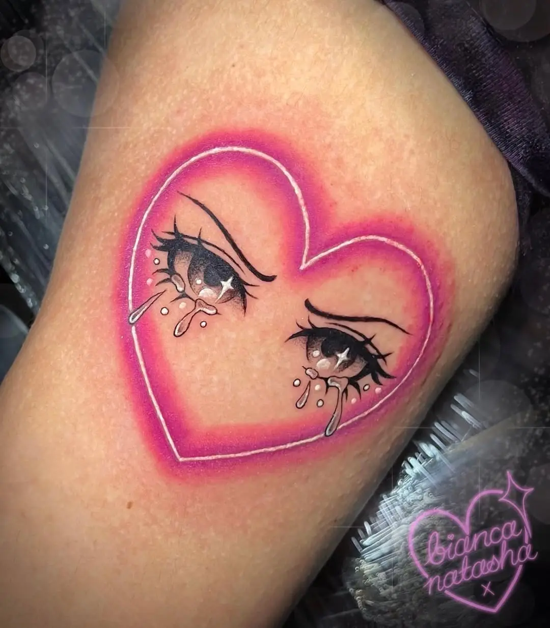 Emotional neon heart tattoo design with tears