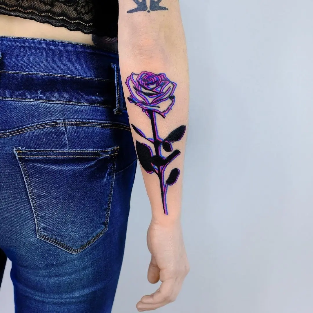 Vibrant Neon Rose Tattoo on Forearm