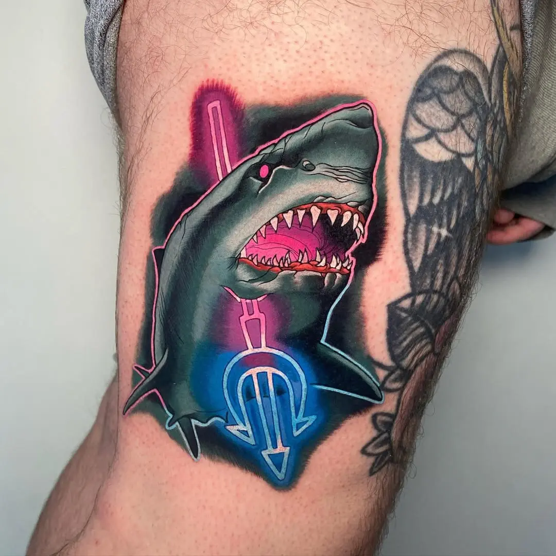 Vibrant neon shark tattoo with striking colors