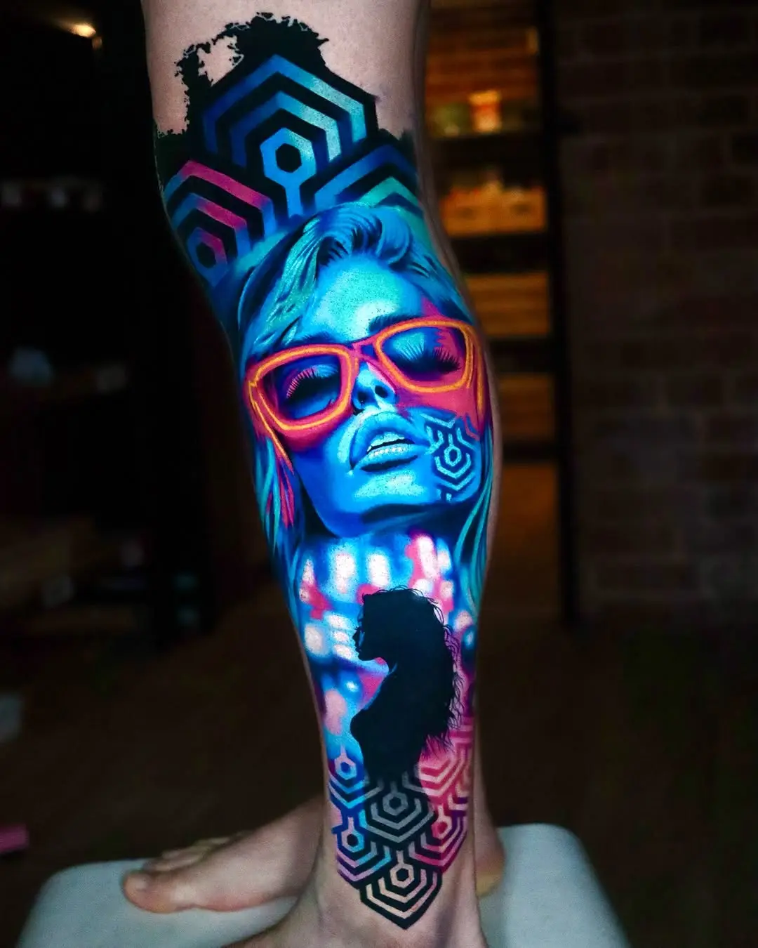 Vibrant Neon Tattoo with Geometric Patterns