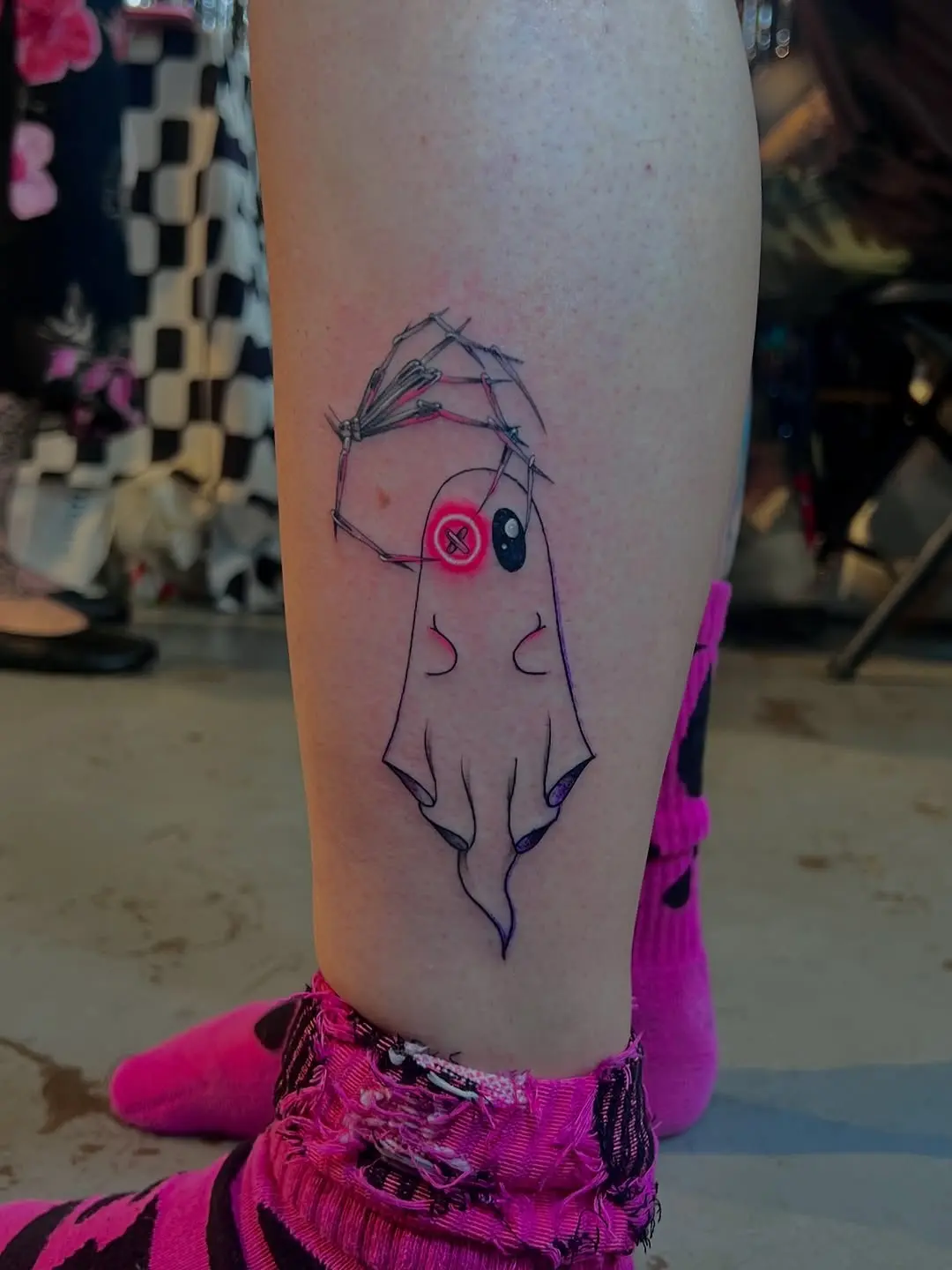 Playful Neon Ghost Tattoo Design