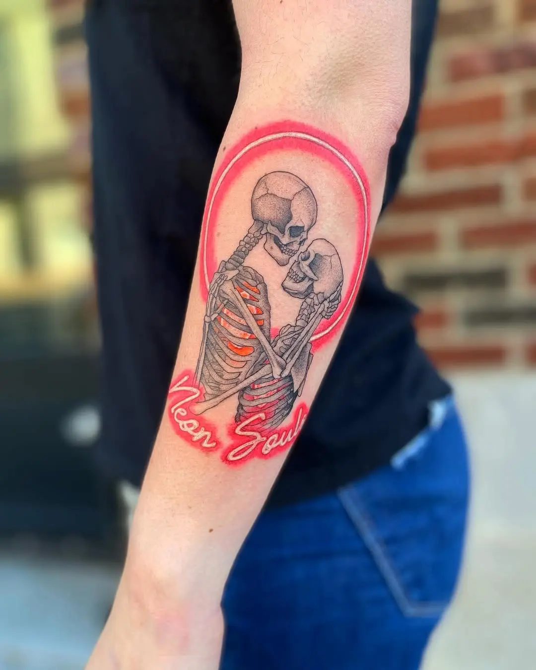Eerie yet vibrant neon skeleton tattoos