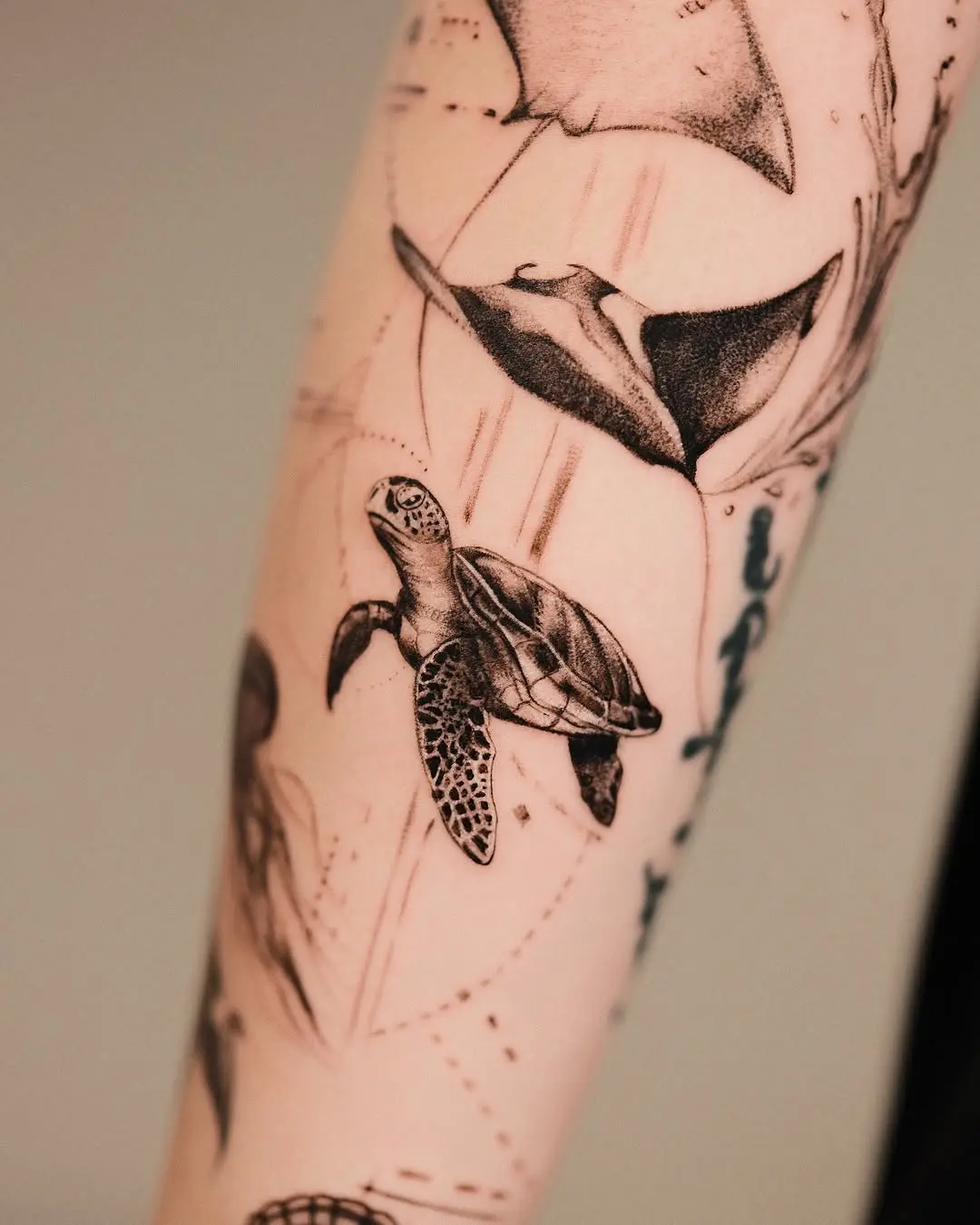 Detailed turtle tattoo representing ocean life
