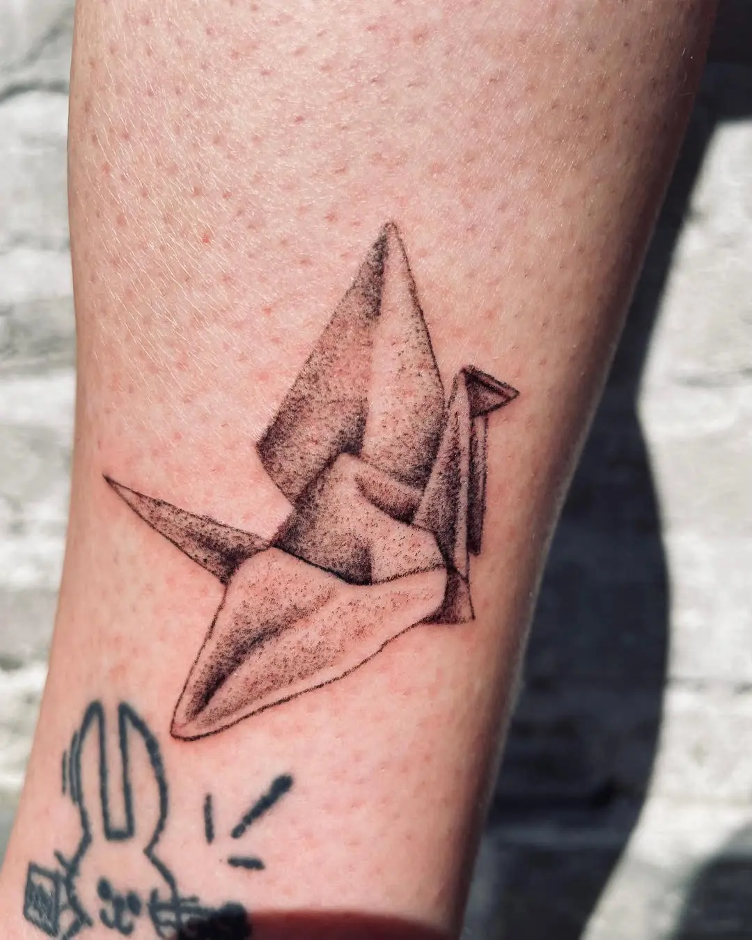 Stunning Crane Origami Tattoo Design on Skin