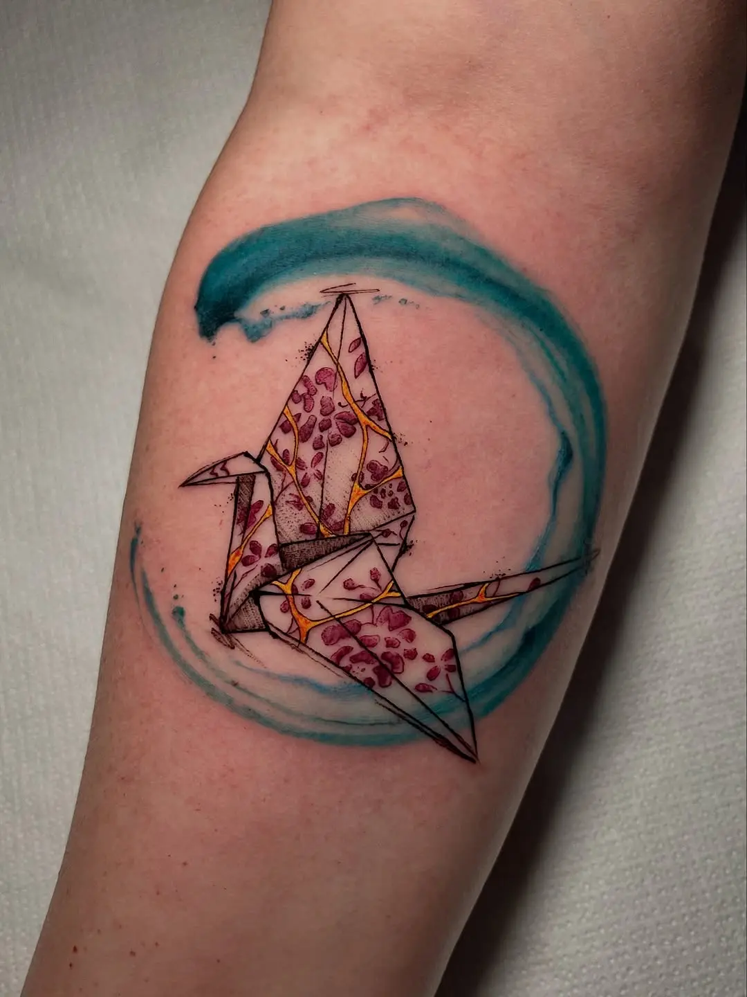 Beautiful origami crane tattoo blending elegance and artistry