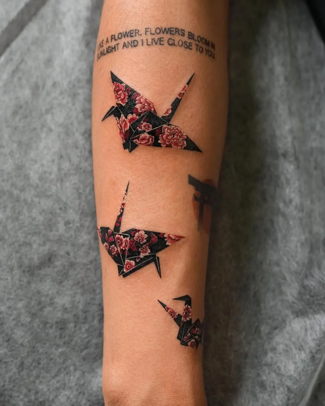 Elegant origami cranes adorned with floral patterns