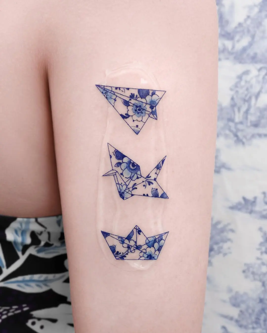 Delicate floral origami crane tattoo collection
