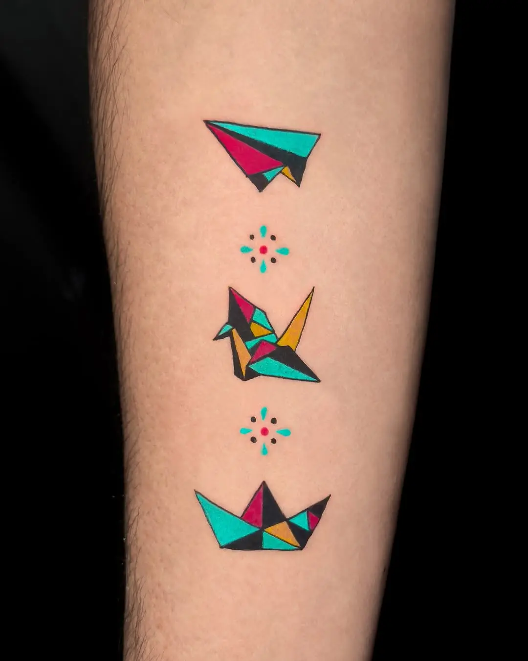 Vibrant origami tattoos with geometric designs