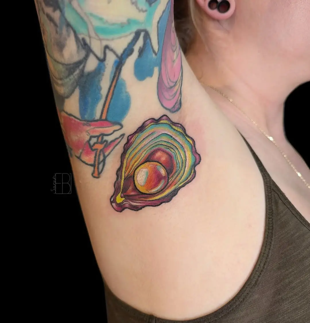 Vibrant oyster tattoo with intricate detailing