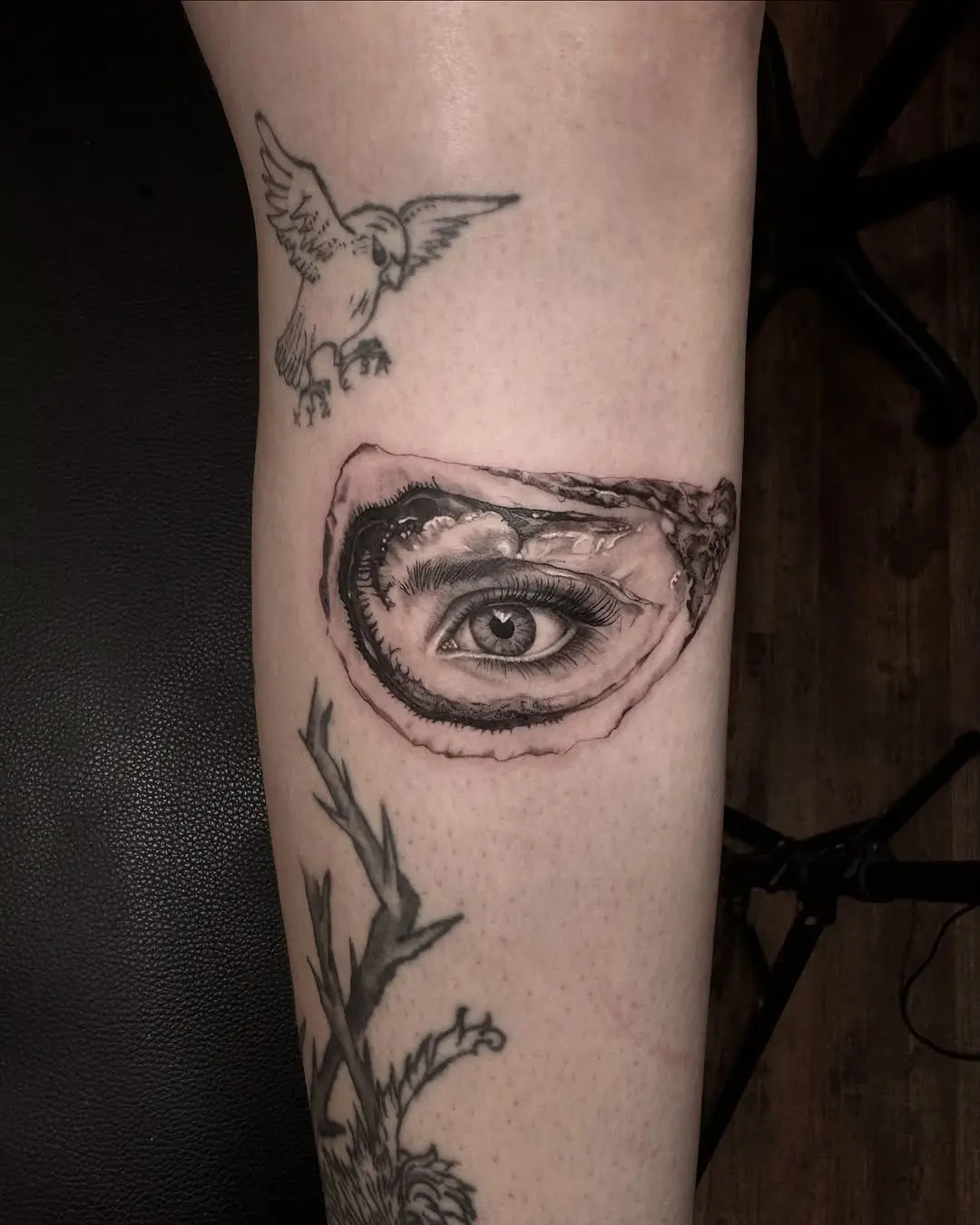 Intricate Oyster Tattoo with Hidden Eye