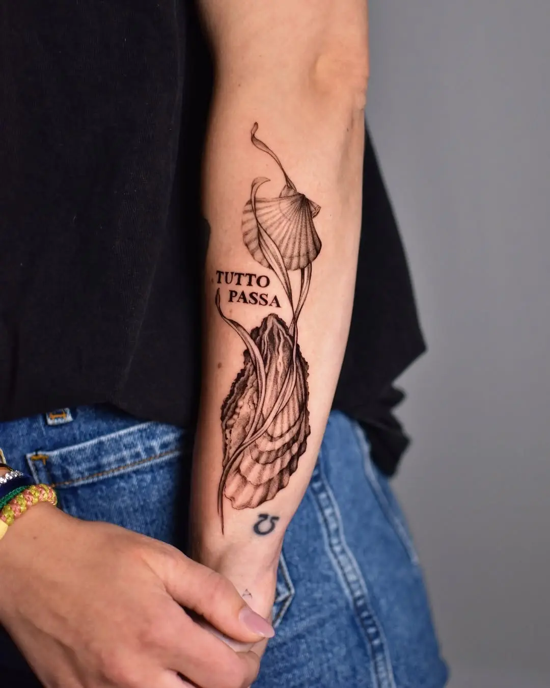 Elegant oyster tattoo with a meaningful quote