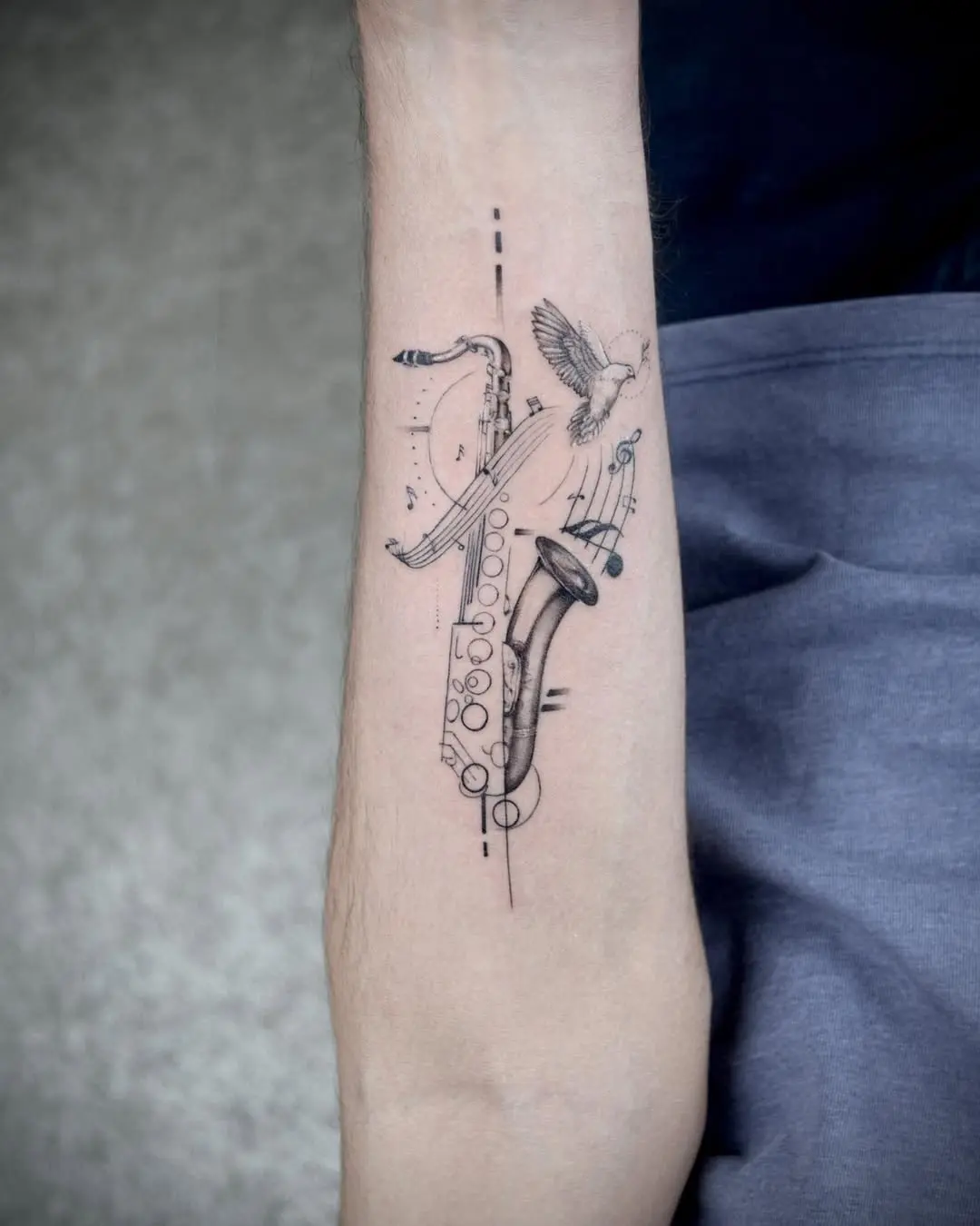 Elegant saxophone tattoo with musical notes