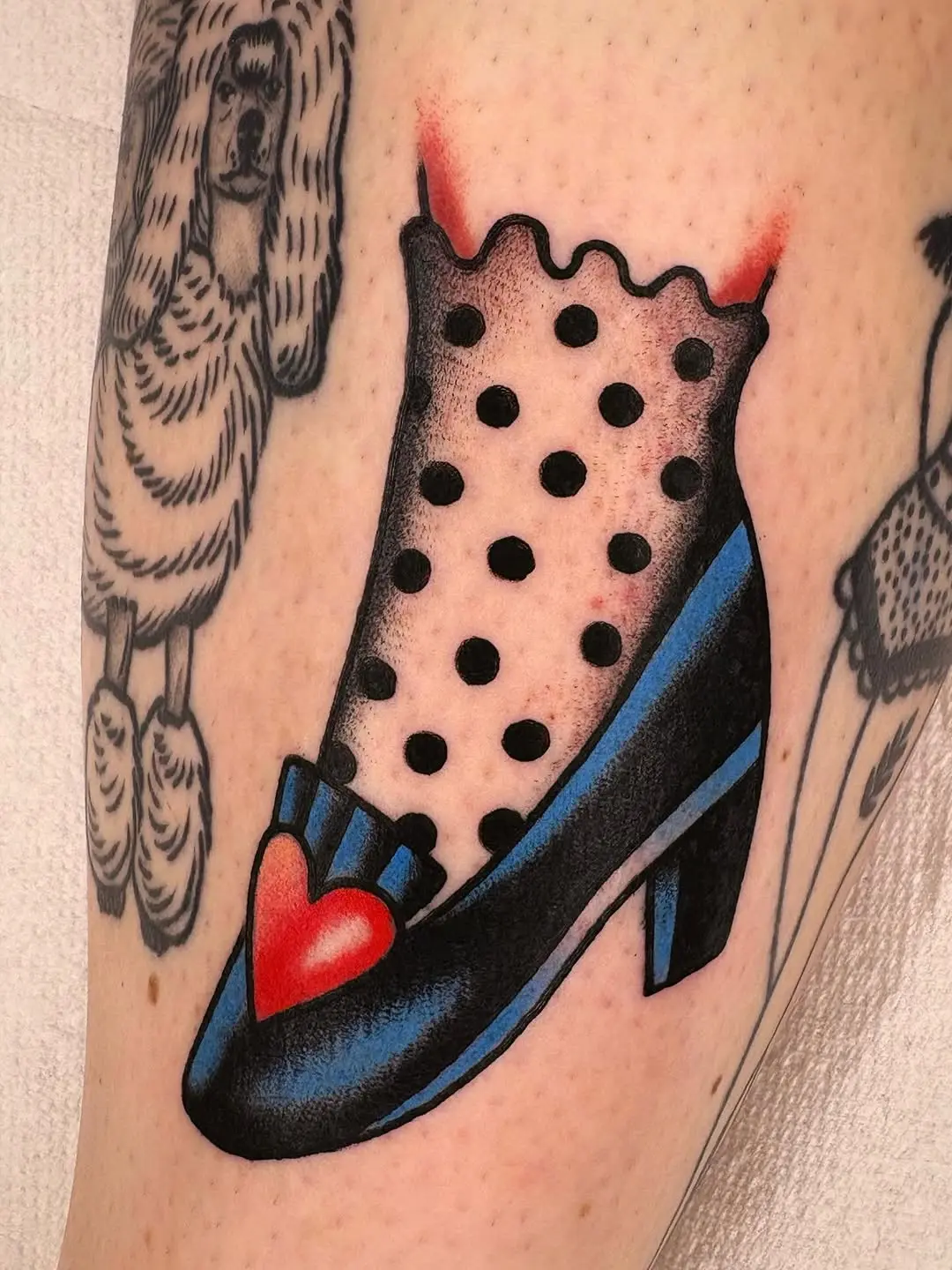 Chic and playful polka dot high heel tattoo