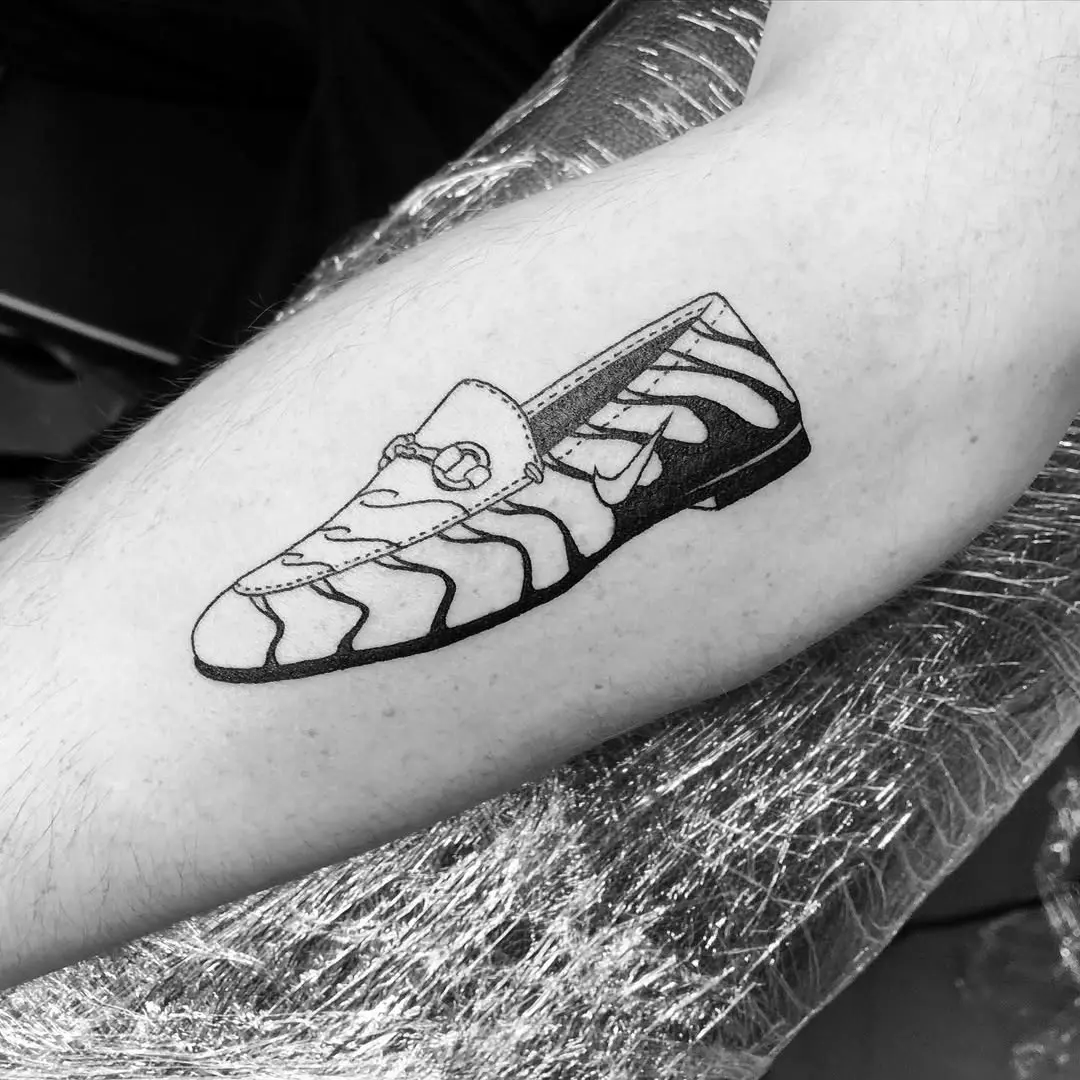 Unique zebra print shoe tattoo design
