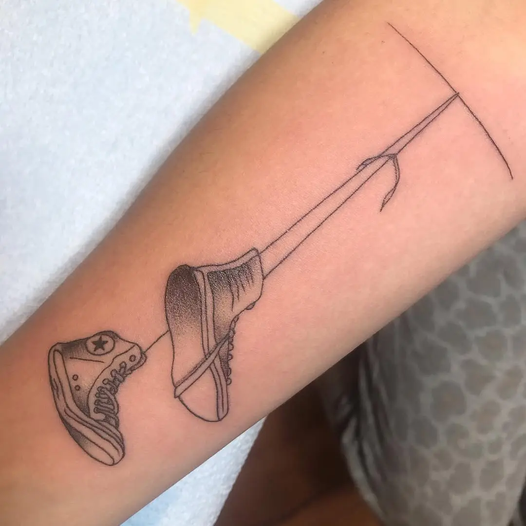 Unique sneaker tattoo design with clean lines