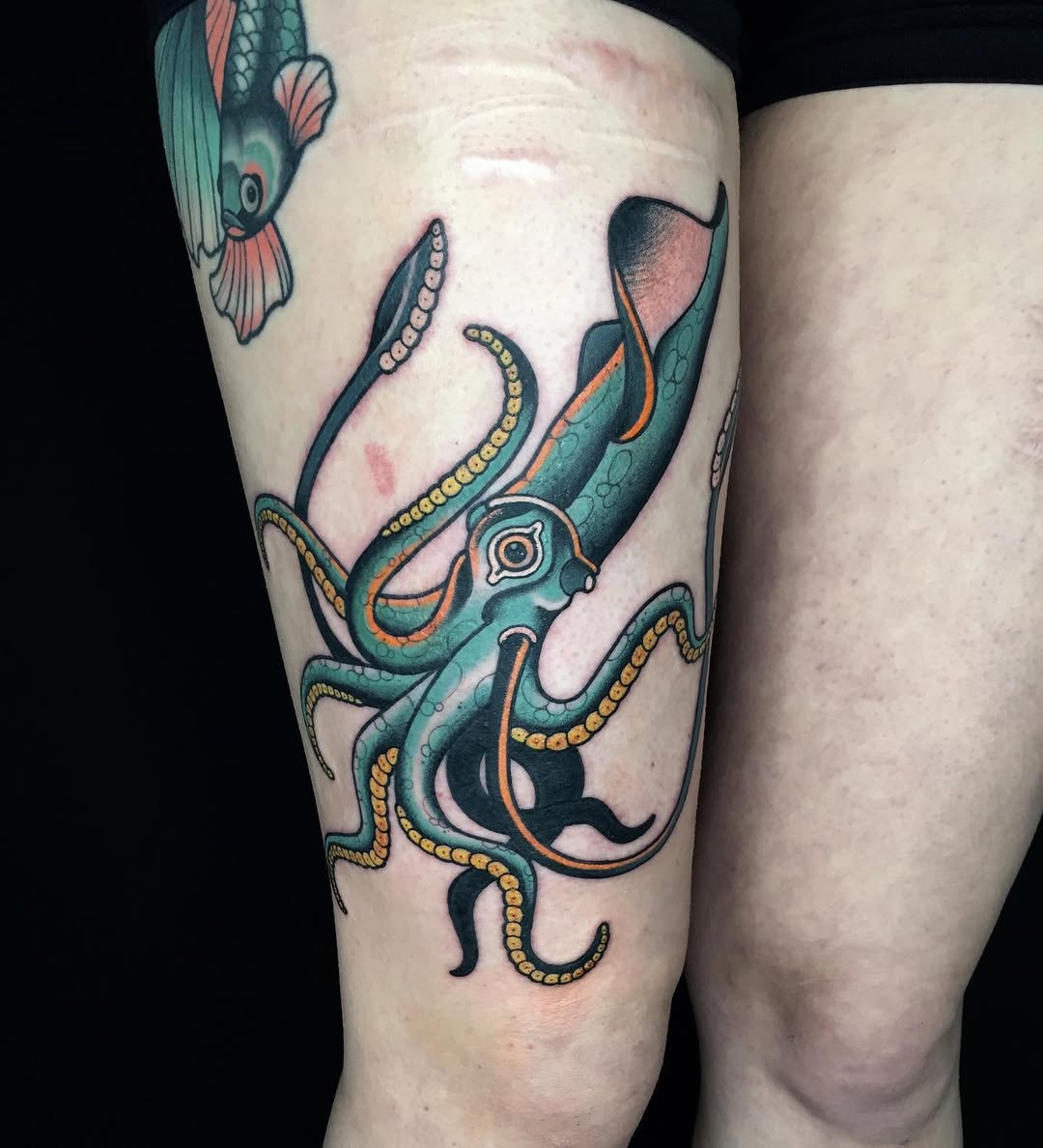 Vibrant squid tattoo with intricate details