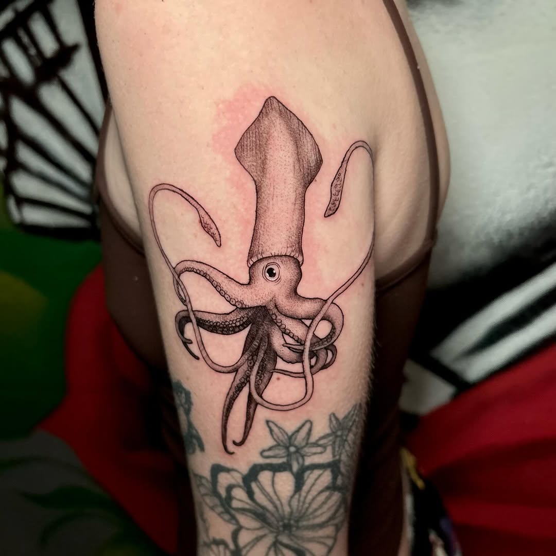 Stunning squid tattoo with intricate details
