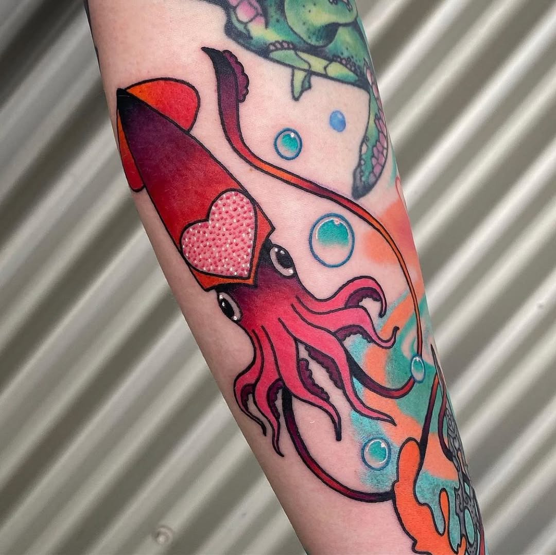 Colorful squid tattoo with heart details