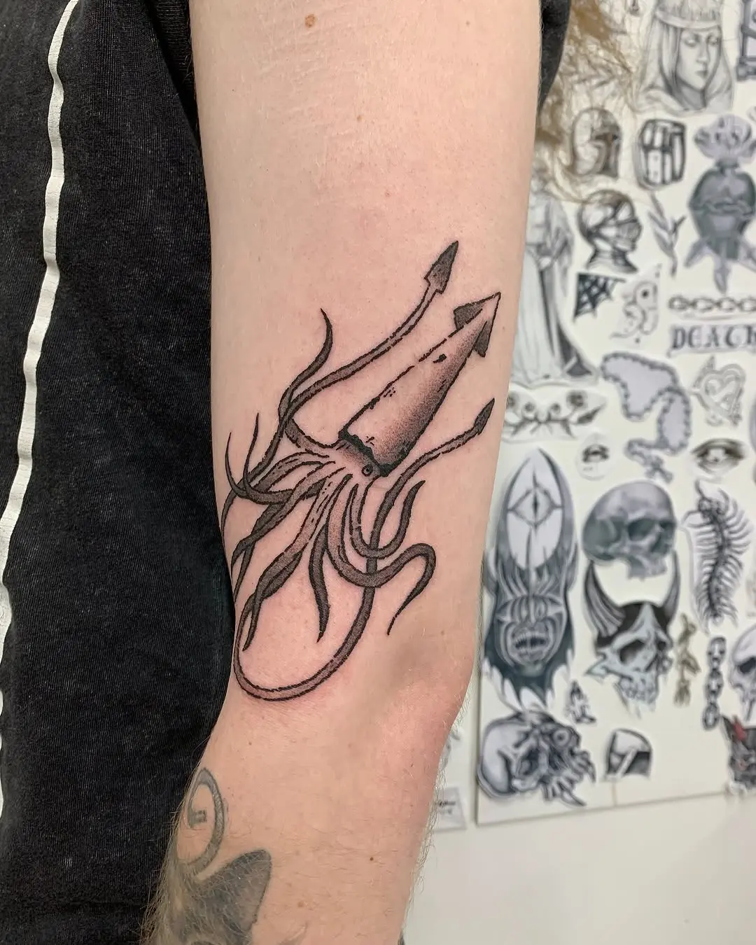 Intricate squid tattoo showcasing artistic flair