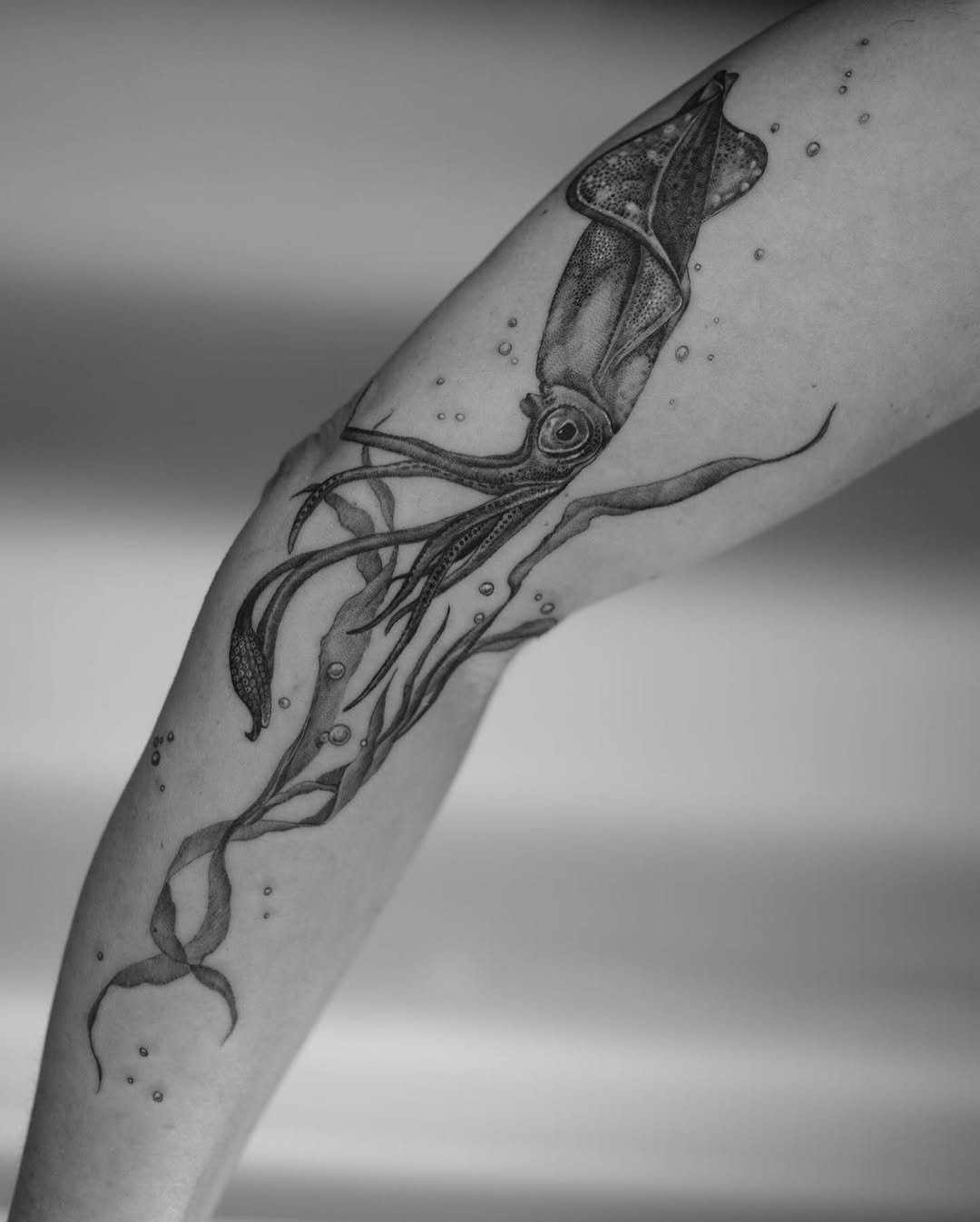 Intricate Black and Gray Squid Tattoo Design