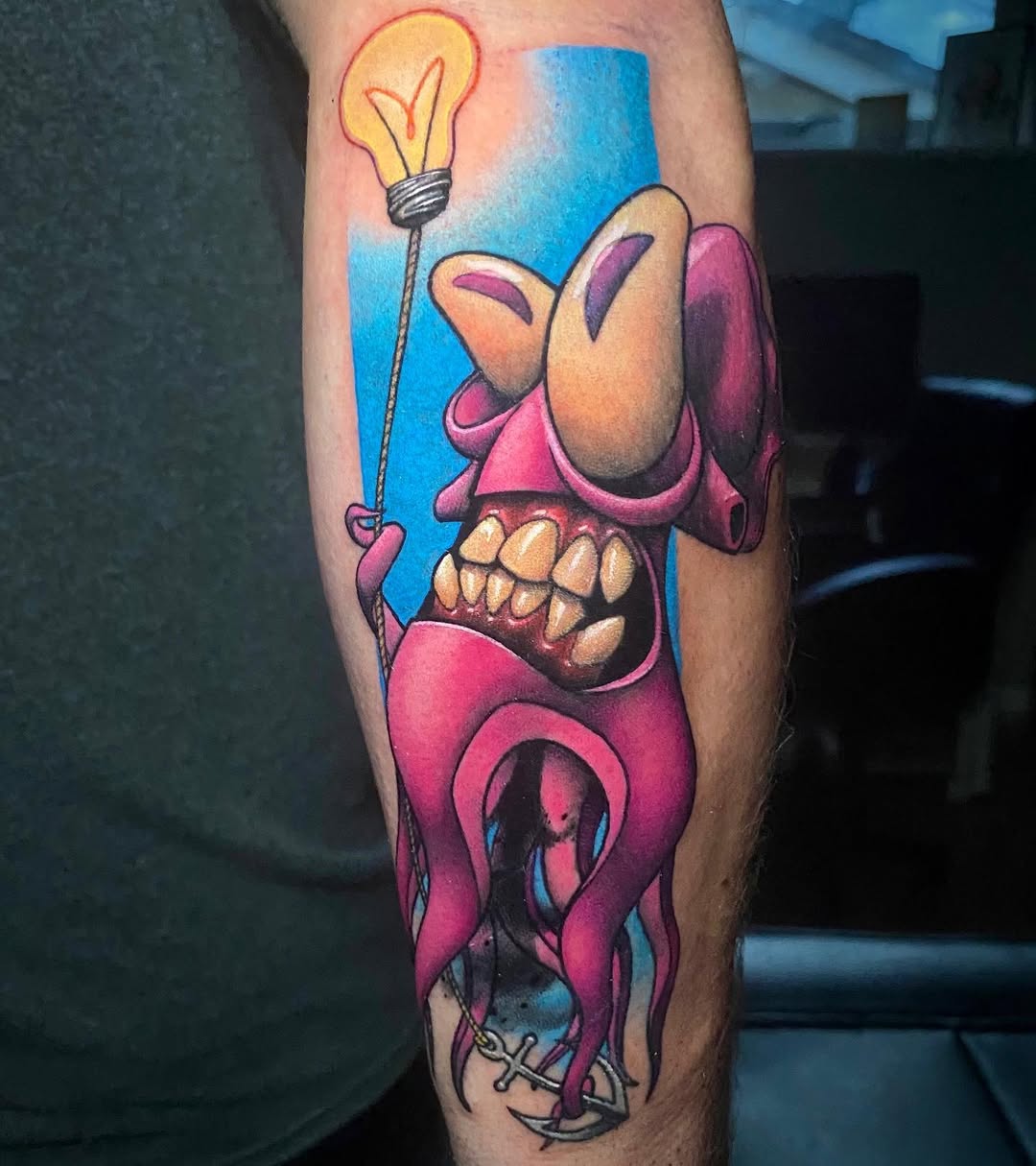 Whimsical squid tattoo with a light bulb