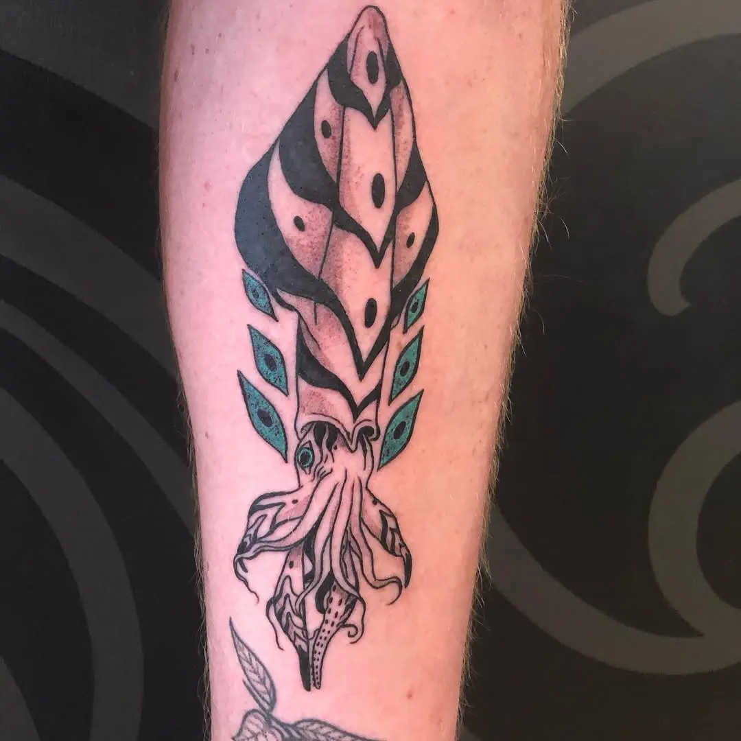 vibrant squid tattoo with bold designs
