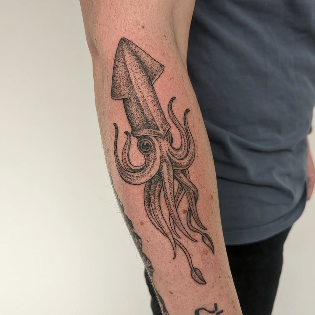 Detailed squid tattoo with striking realism