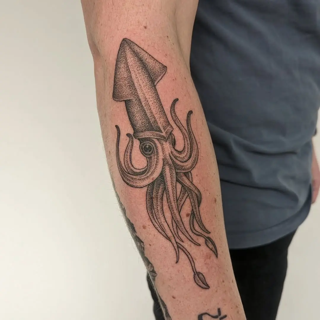 Detailed squid tattoo with striking realism