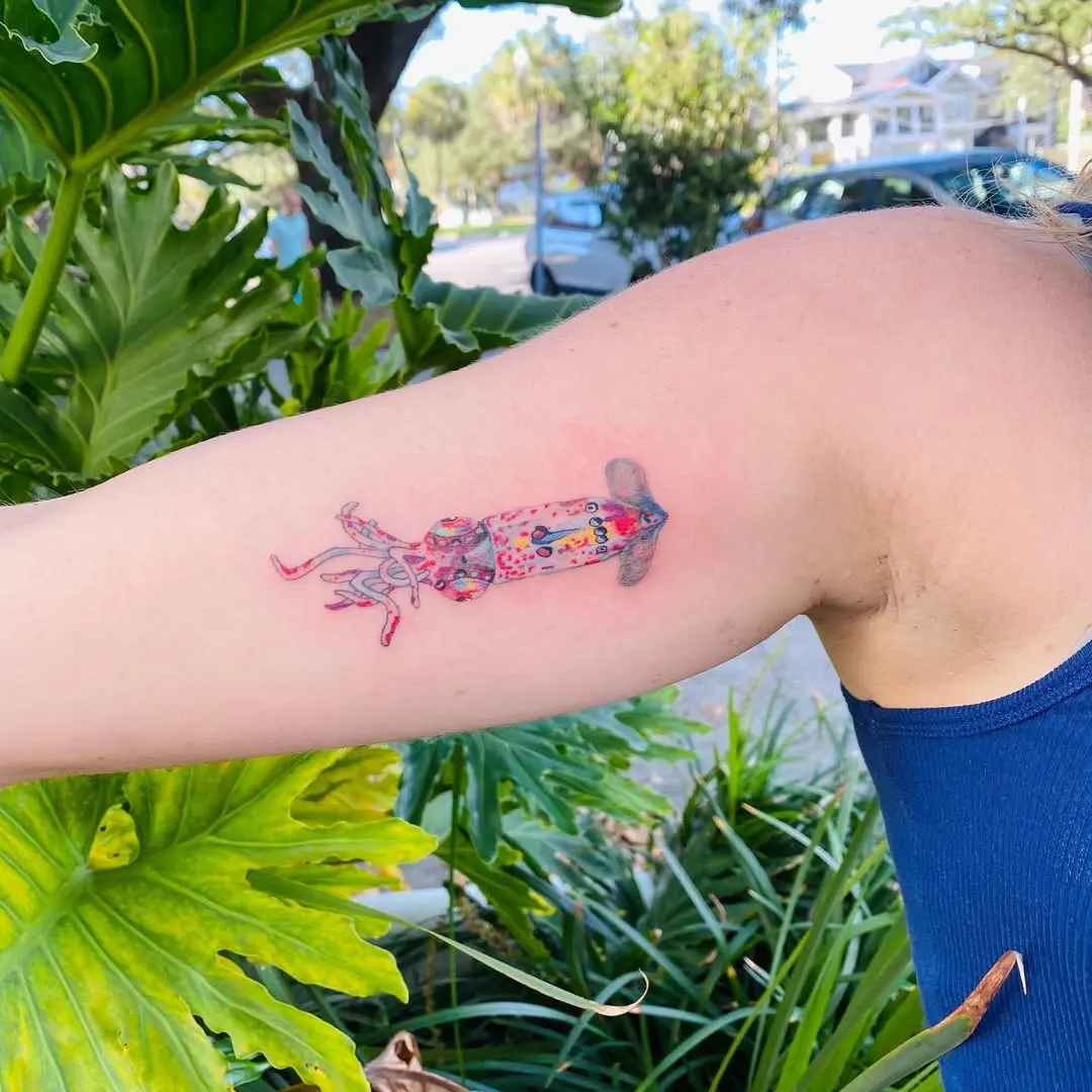 Colorful squid tattoo on arm for unique flair
