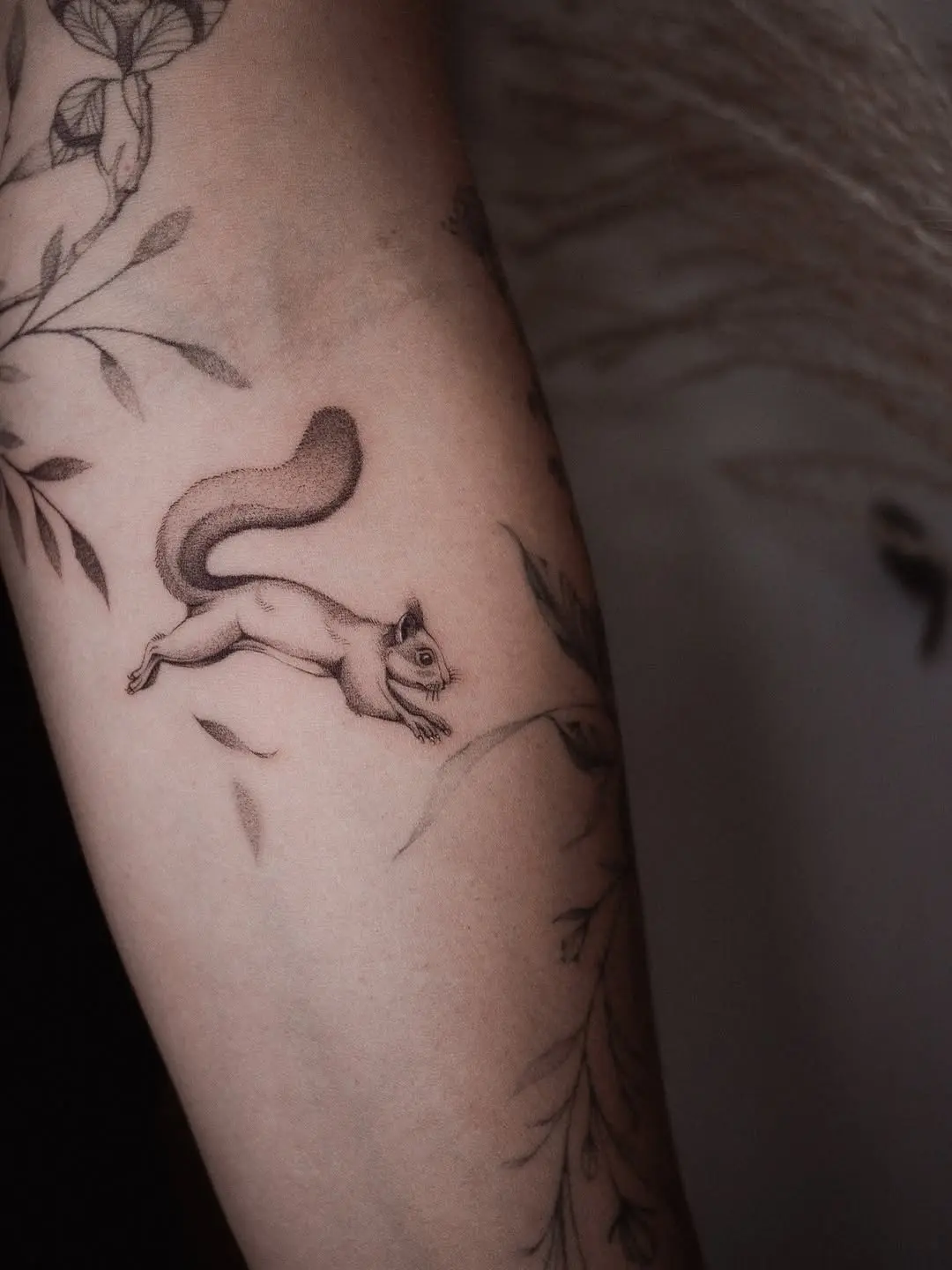 Elegant Squirrel Tattoo with Nature Elements