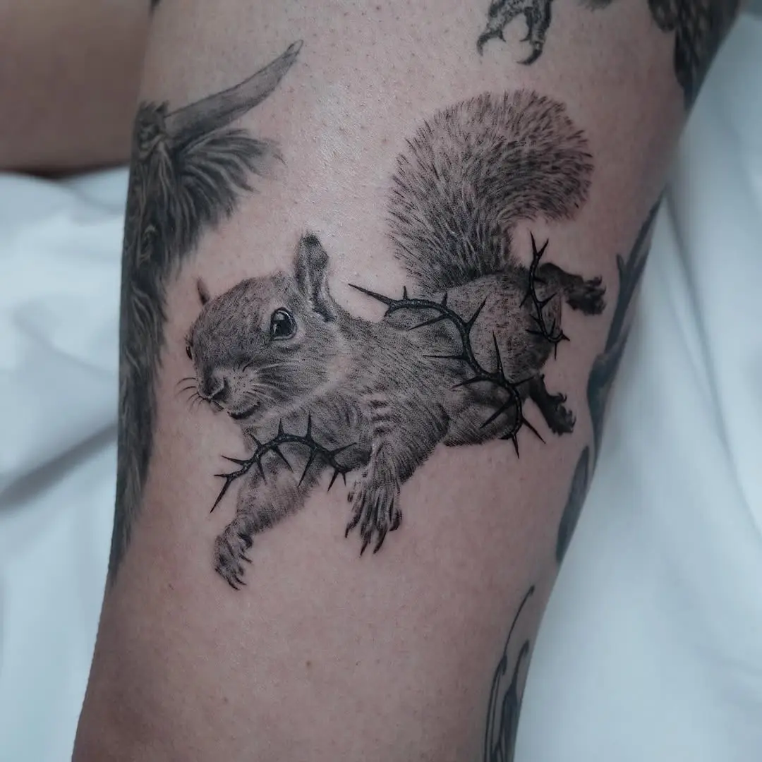 Squirrel Tattoo Breaking Through Thorns