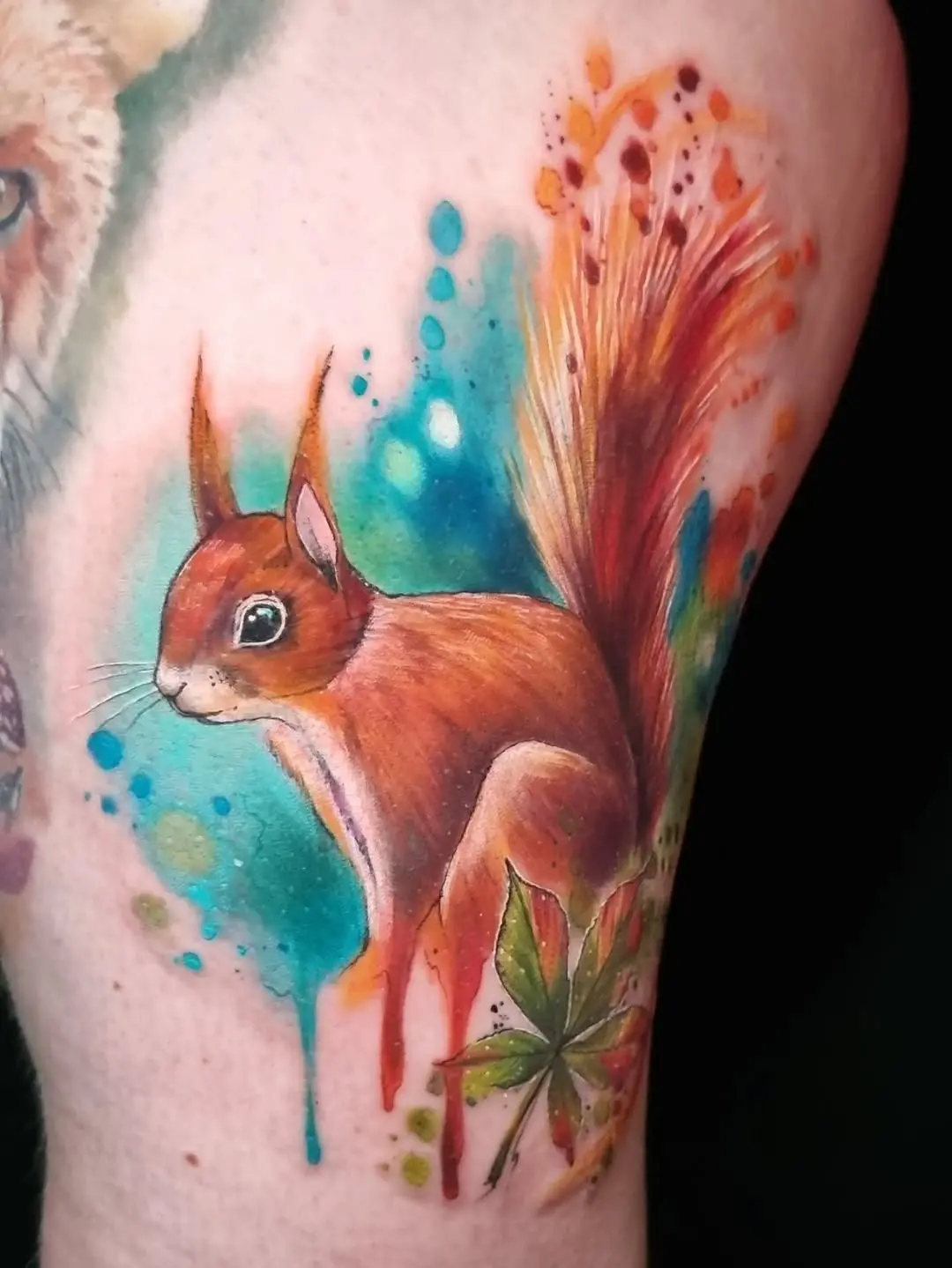 Vibrant Squirrel Tattoo with Nature Accents
