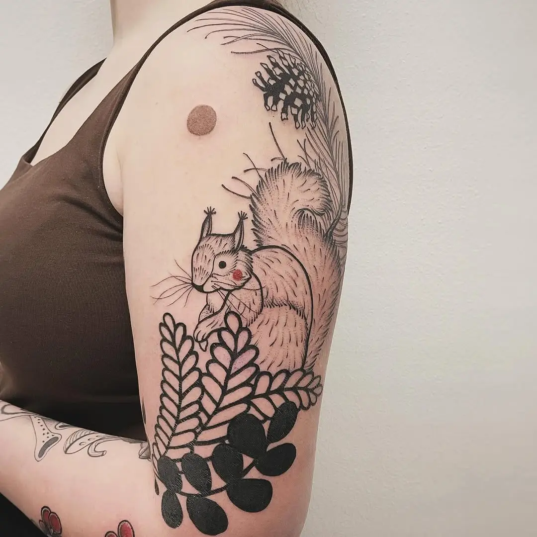 Charming squirrel tattoo amidst lush foliage