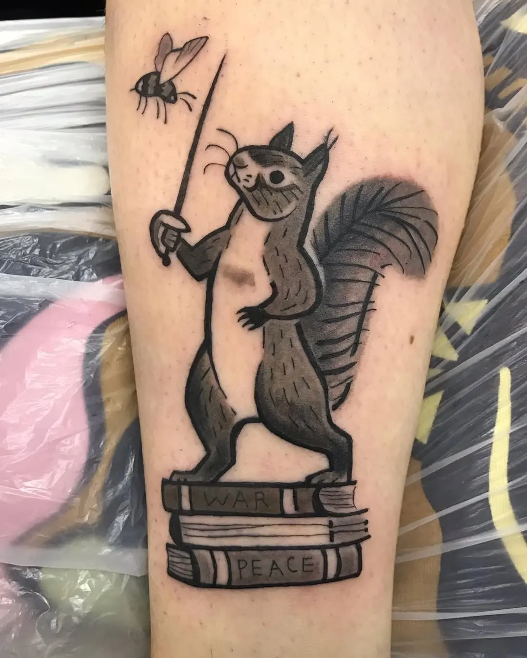 Whimsical squirrel tattoo symbolizing duality