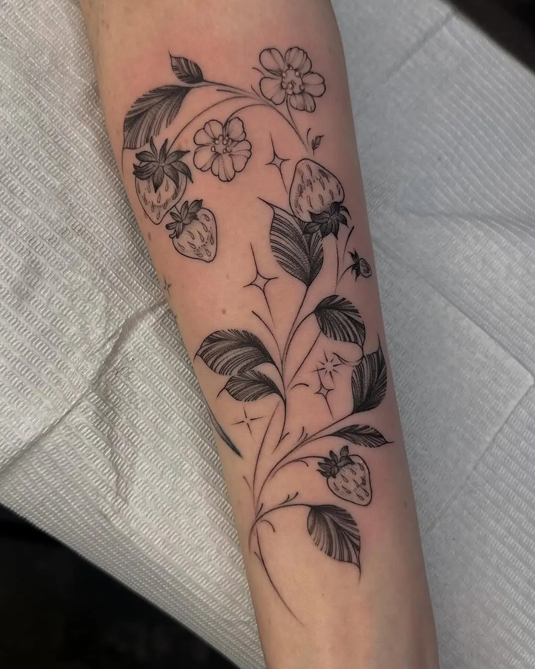Elegant Strawberry Floral Tattoo Design